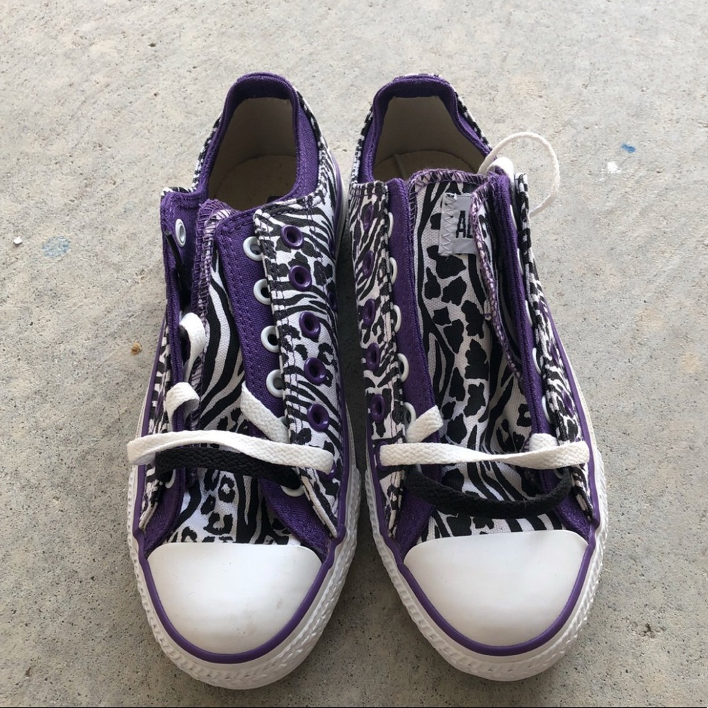 Black purple and zebra converse